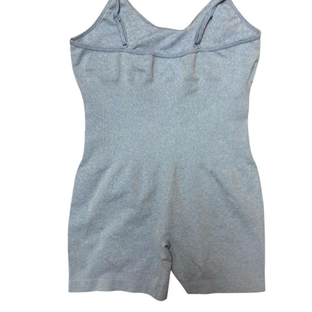 Oqq body con‎ onesie